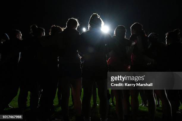 Players huddle during a Hawke's Bay Farah Palmer Cup training session at Tareha Park on August 16, 2018 in Napier, New Zealand.