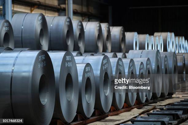 Coils of steel sit in storage on the cold rolling line ahead of milling at the Thyssenkrupp Rasselstein GmbH steel packaging factory in Andernach,...
