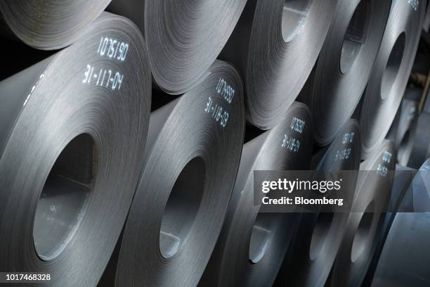 Coils of steel sit in storage on the cold rolling line ahead of milling at the Thyssenkrupp Rasselstein GmbH steel packaging factory in Andernach,...