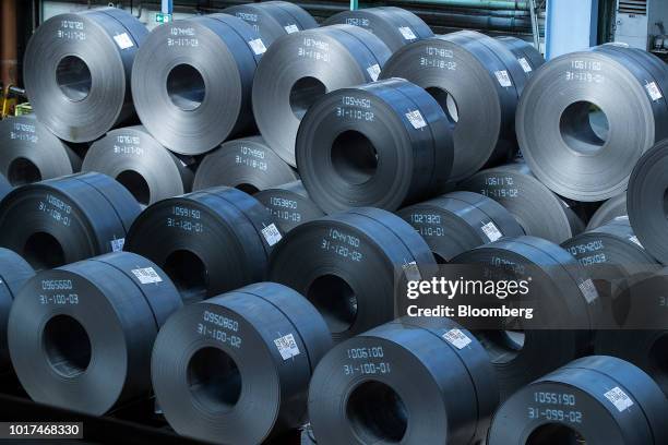 Coils of steel sit in storage on the cold rolling line ahead of milling at the Thyssenkrupp Rasselstein GmbH steel packaging factory in Andernach,...