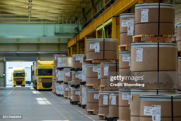 Packaged steel coils await shipping at the Thyssenkrupp Rasselstein GmbH steel packaging factory in Andernach, Germany, on Thursday, Aug. 9, 2018....