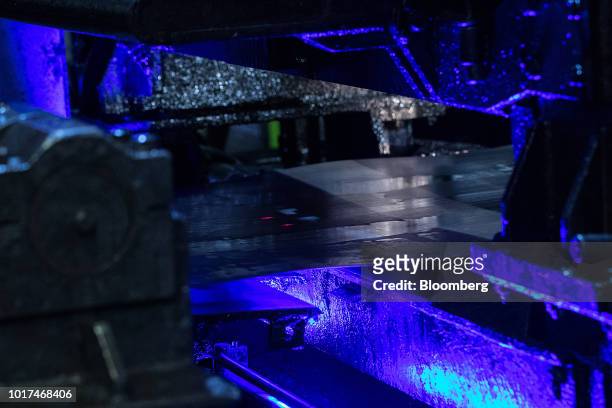 Steel sheet moves along the cold rolling line at the Thyssenkrupp Rasselstein GmbH steel packaging factory in Andernach, Germany, on Thursday, Aug....
