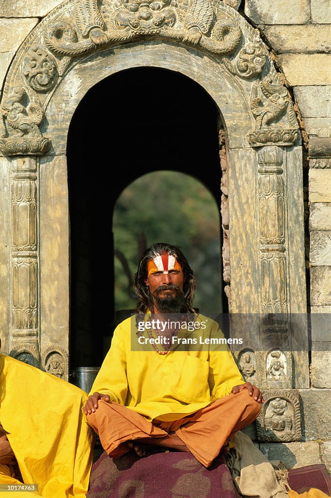SADHU (HOLY MAN) IN ARCHWAY, NEPAL