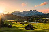Magic Sunrise at Alpine Lake Geroldsee - view to mount Karwendel, Garmisch Partenkirchen, Alps