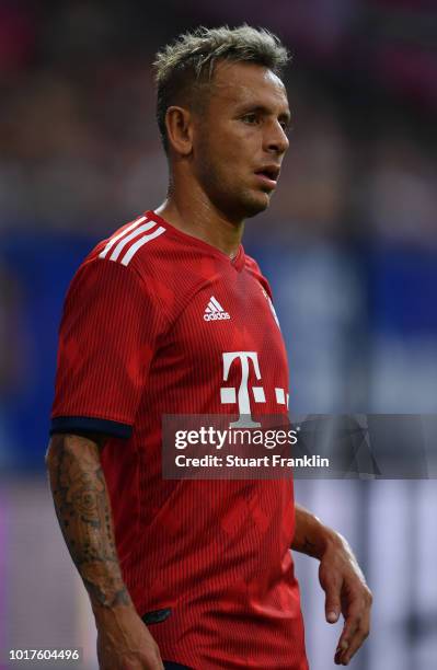 Thiago of Muenchen looks on during the friendly match between Hamburger SV and Bayern Muenchen at Volksparkstadion on August 15, 2018 in Hamburg,...