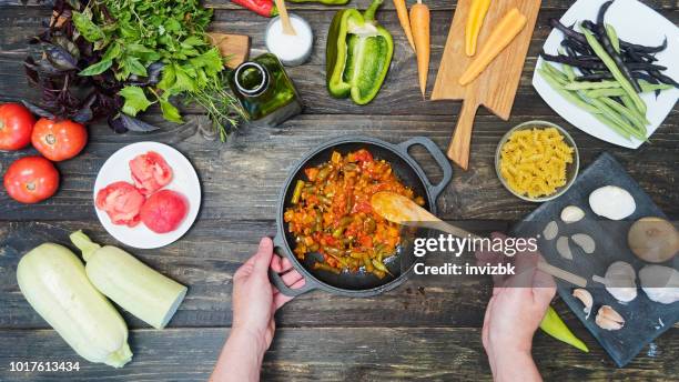 preparing minestrone soup - green beans overhead stock pictures, royalty-free photos & images
