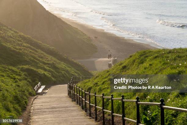 steps down to the beach at saltburn-by-the-sea, north yorkshire, england - saltburn stock pictures, royalty-free photos & images