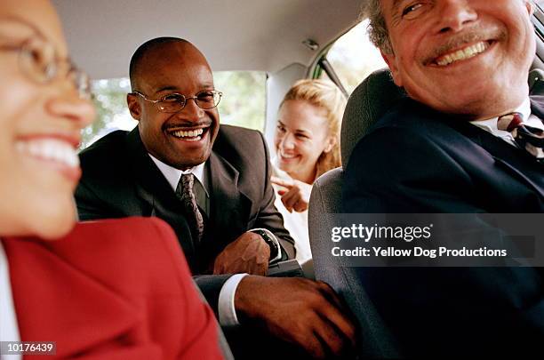 business people in car - carpool stock pictures, royalty-free photos & images