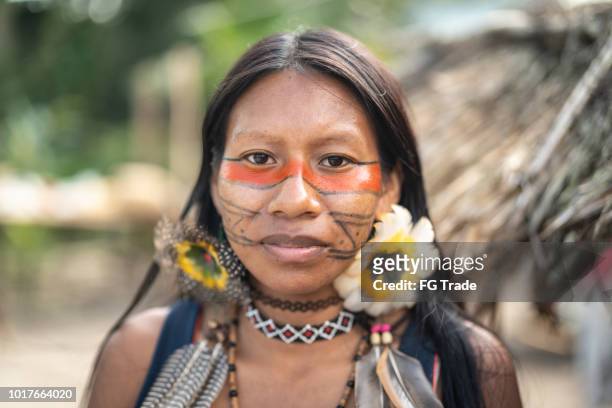 indigenous brazilian young woman, portrait from guarani ethnicity - body art stock pictures, royalty-free photos & images