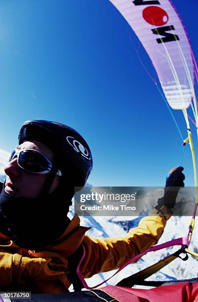 paragliding pilot in flight - skydive close up stock pictures, royalty-free photos & images