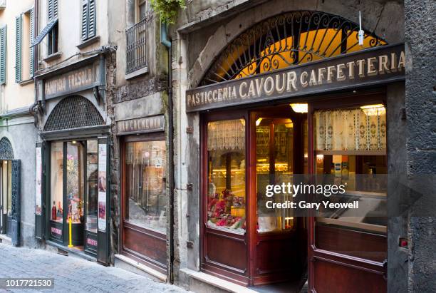narrow cobbled street in bergamo - bergamo stock pictures, royalty-free photos & images