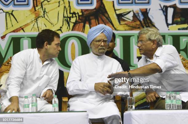 Congress President Rahul Gandhi and Former Prime Minister Manmohan Singh with CPI-M leader Sitaram Yechury during Saanjhi Virasat Bachao Sammelan at...