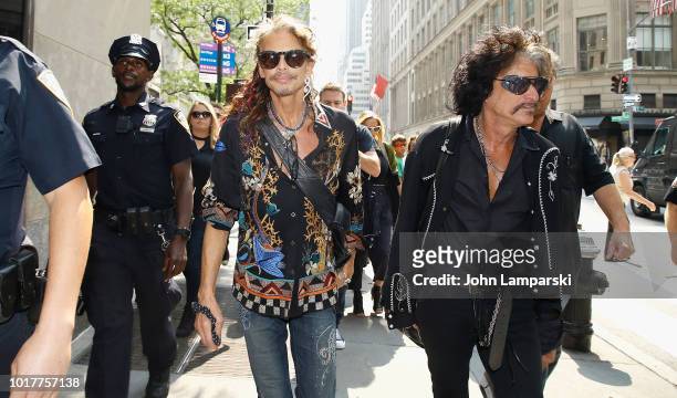 Steven Tyler and Joe Perry of Aerosmith depart for the Tonight Show appearance on August 16, 2018 in New York City.