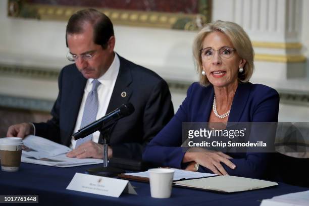 Health and Human Services Secretary Alex Azar and Education Secretary Betsy DeVos participate in a meeting of the Federal Commission on School Safety...