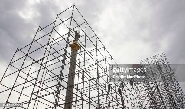 Workers install a construction for the Independence Day stage, on the Independence square in Kyiv, Ukraine, 16 August,2018. 4,5 thousand troops and...