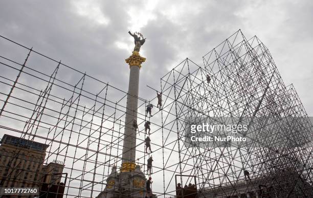 Workers install a construction for the Independence Day stage, on the Independence square in Kyiv, Ukraine, 16 August,2018. 4,5 thousand troops and...