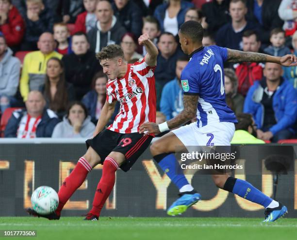 Elliot Embleton of Sunderland takes on Liam Palmer of Sheffield Wednesday during the Carabao Cup First Round match between Sunderland and Sheffield...