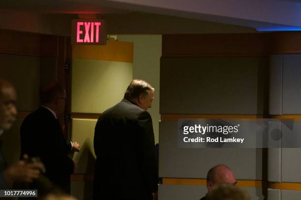 Secretary of State Mike Pompeo makes his exit after announcing the creation of the Iran Action Group at the Department of State on August 16, 2018 in...