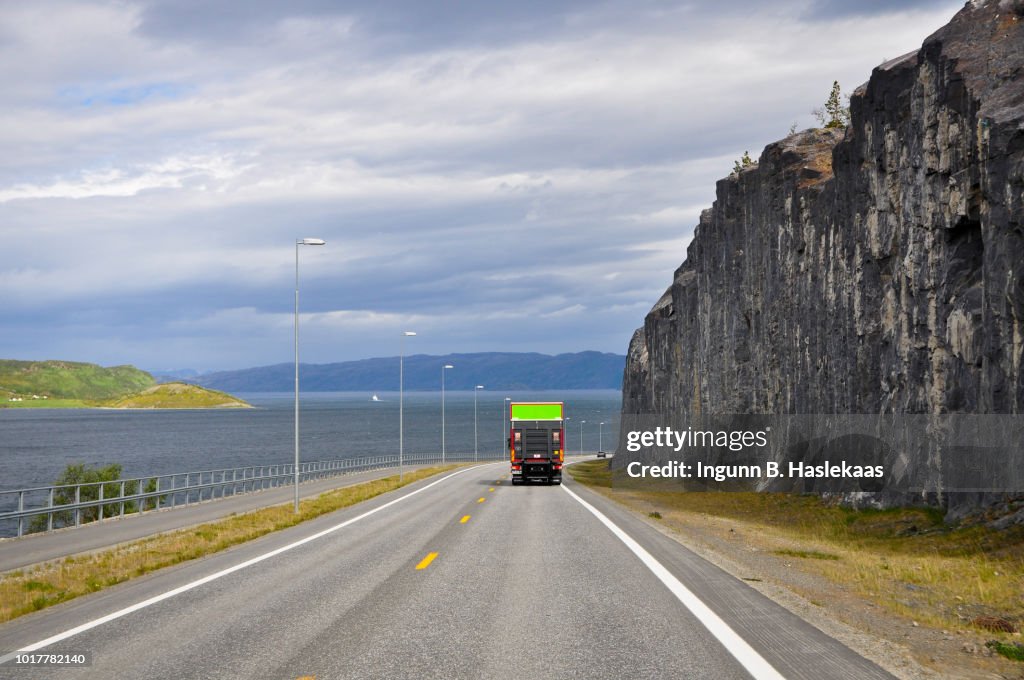 On the road again. Summer in arctic Norway. Heading for Alta. Truck on the road.