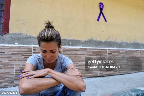 Yamiled Carmona relative of Elcy Vergara one of the 19 Colombian victims involved in a bus accident in Ecuador that left 24 dead, is pictured in...