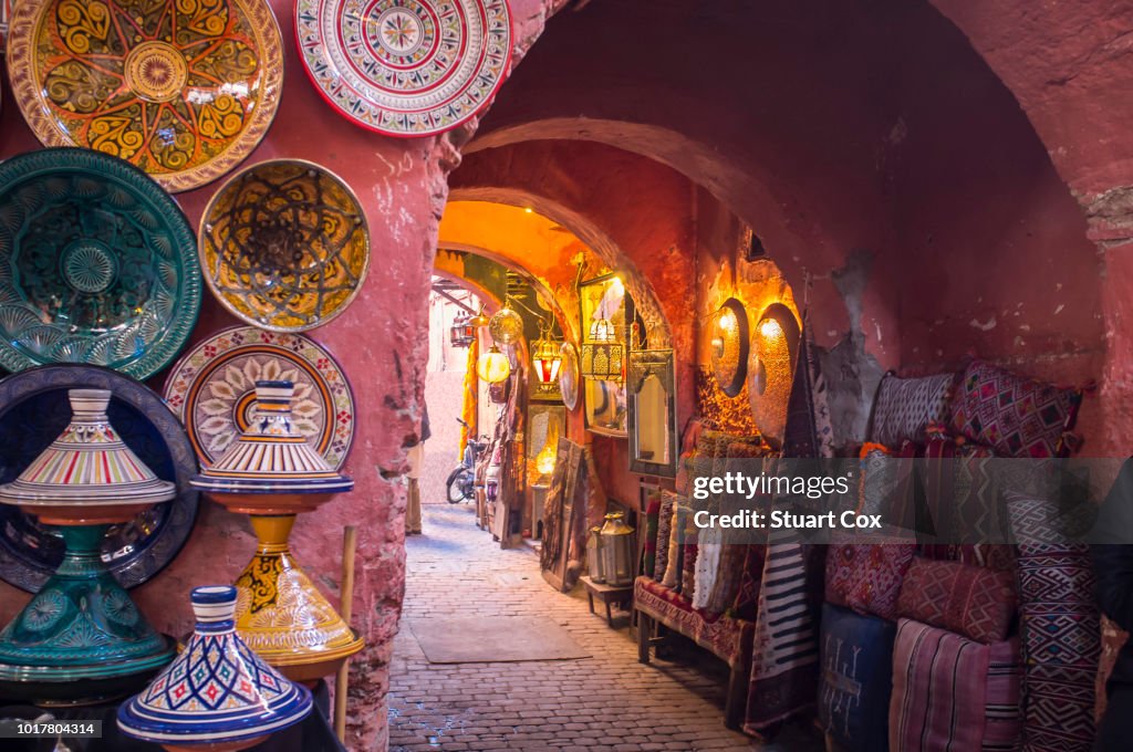 The souks in the medina of Marrakech are a made of a labyrinth of alleyways lined with traders and shops selling traditional arts and crafts.