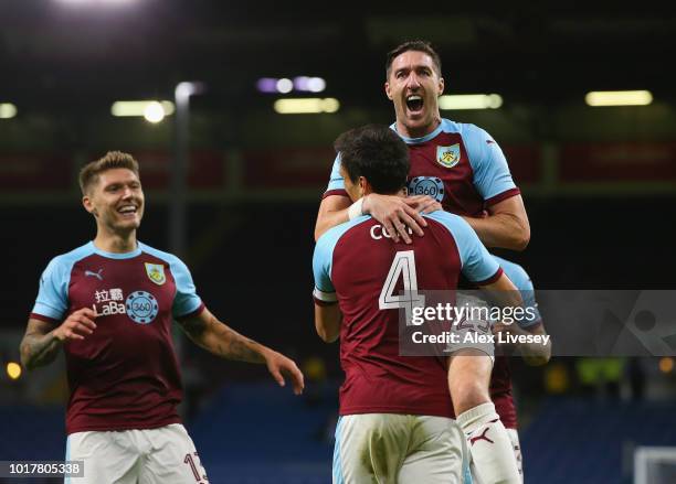 Stephen Ward of Burnley congratulates goal scorer Jack Cork during the UEFA Europa League third round qualifier second leg between Burnley and...