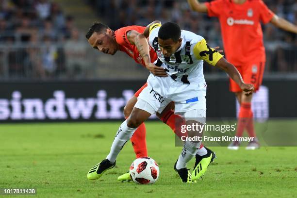 Adriano Correia Claro of Besiktas and Joao Victor Santos Sa of LASK compete for the ball during the UEFA Europa League Third Round Qualifier: Second...