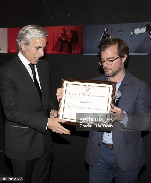 Imanol Arias and Buenos Aires Minister of Culture Enrique Avogadro attend 'Imanol Arias Named Guest Of Honour In Buenos Aires' ceremony at the Maipo...
