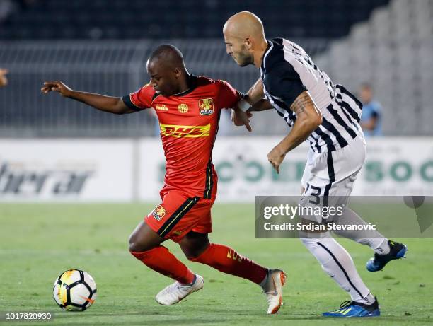 Jonathan Amon of Nordsjaelland in action against Nemanja Miletic of Partizan during the UEFA Europa League Third Round Qualifier Second Leg match...