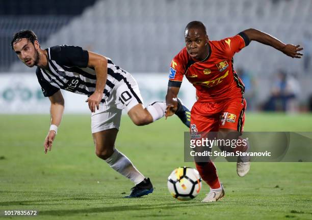 Jonathan Amon of Nordsjaelland in action against Marko Jankovic of Partizan during the UEFA Europa League Third Round Qualifier Second Leg match...