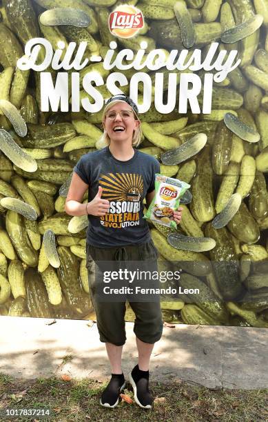 Television host and online personality Hannah Hart and Kehde's Barbeque General Manager Roger Kehde celebrate the release of Lay's Fried Pickles with...