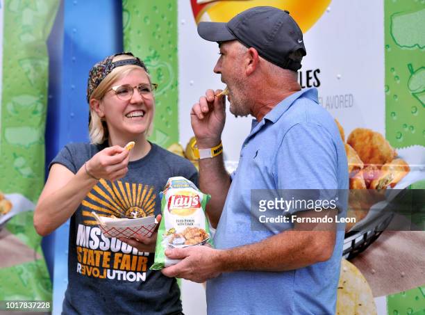 Television host and online personality Hannah Hart and Kehde's Barbeque General Manager Roger Kehde celebrate the release of Lay's Fried Pickles with...