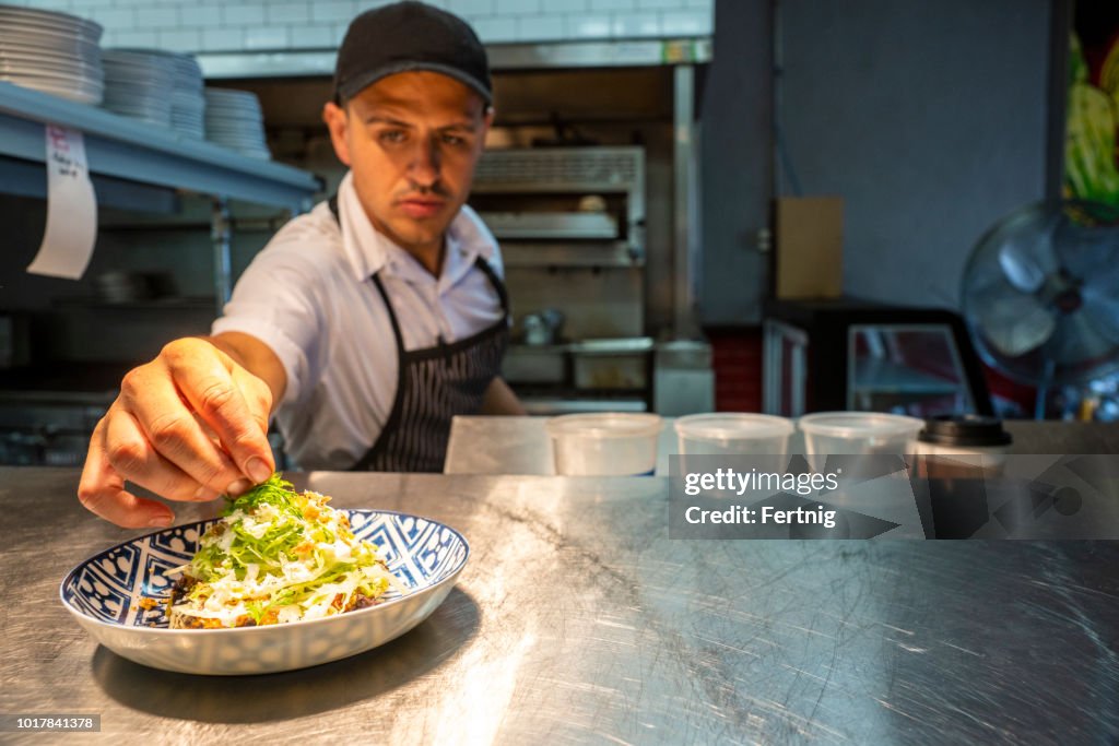 Mexican chef working in an authentic Mexican restaurant