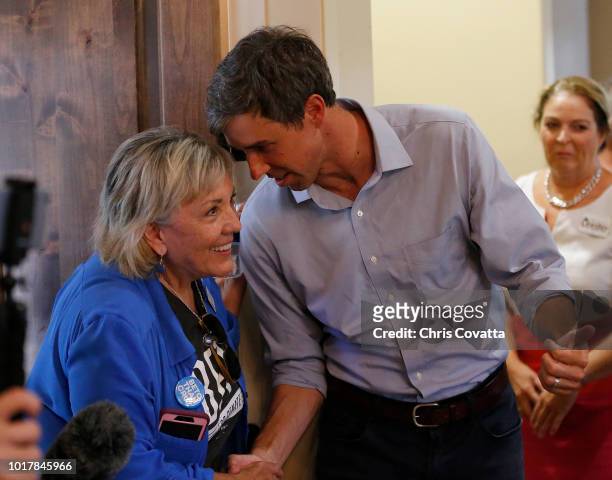 Rep Beto O'Rourke of El Paso greets Llano county Democrat Party chair Dana Rushing before a town hall meeting at the Quail Point Lodge on August 16,...