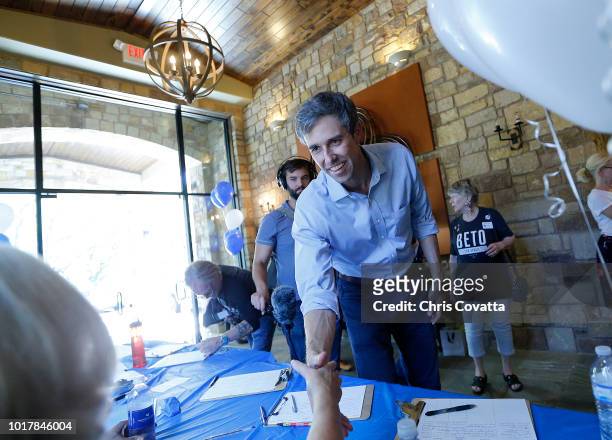 Rep Beto O'Rourke of El Paso greets a supporter before a town hall meeting at the Quail Point Lodge on August 16, 2018 in Horseshoe Bay, Texas....