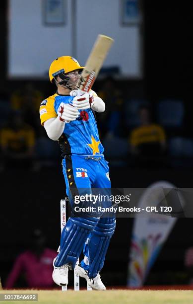 In this handout image provided by CPL T20, David Warner of St Lucia Stars hits 4 during match 9 of the Hero Caribbean Premier League between St Lucia...