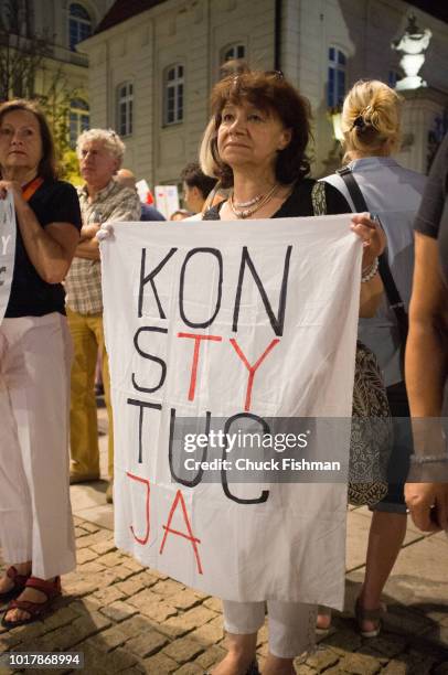 Anti-government protesters gather in front of the presidential palace to rally against a string of judicial reforms that the European Union has...