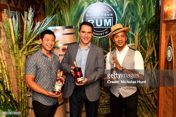 Chris Ha, Roberto Ramirez Laverde and Juan Coronado attend the Raise Your Rum on National Rum Day with BACARDI Rum on August 16, 2018 in New York...