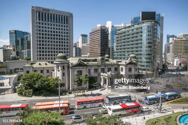 Traffic moves past the Bank of Korea museum at the central bank's headquarters in Seoul, South Korea, on Thursday, Aug. 16, 2018. While the Bank of...