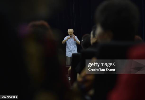 Elderly man performs during a blind date event for chinese valentine's day on August 17, 2018 in Harbin, China.More and more single elderly people...