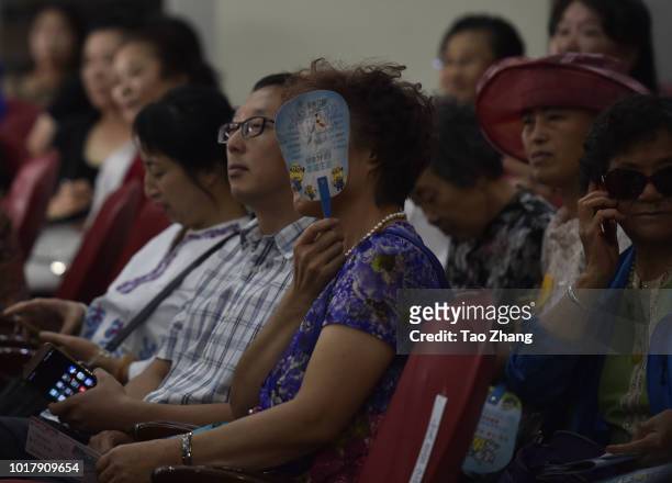 Elderly people attend a blind date for chinese valentine's day on August 17, 2018 in Harbin, China.More and more single elderly people are longing...