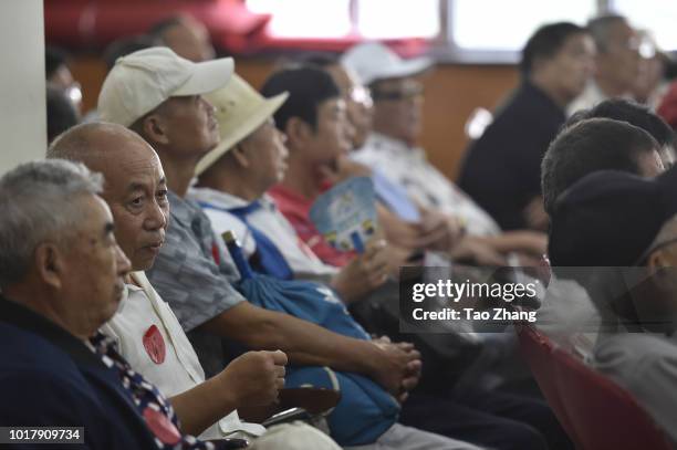 Elderly people attend a blind date for chinese valentine's day on August 17, 2018 in Harbin, China.More and more single elderly people are longing...