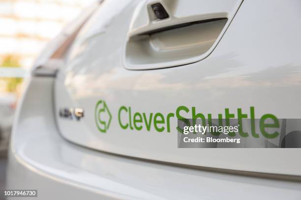 CleverShuttle logo sits on the boot of a Nissan Motor Co. Leaf electric automobile in Berlin, Germany, on Thursday, Aug. 2, 2018. As young people...