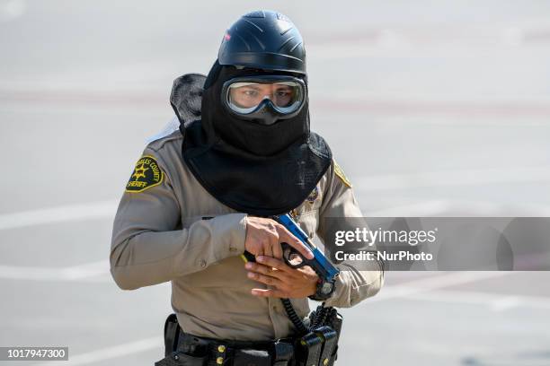 Los Angeles Sheriffs deputy during an active shooter drill in a high school near Los Angeles, California on August 16, 2018.