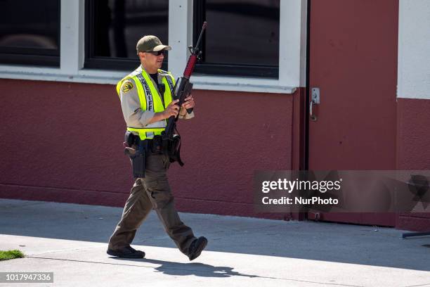 Los Angeles Sheriffs deputy during an active shooter drill in a high school near Los Angeles, California on August 16, 2018.