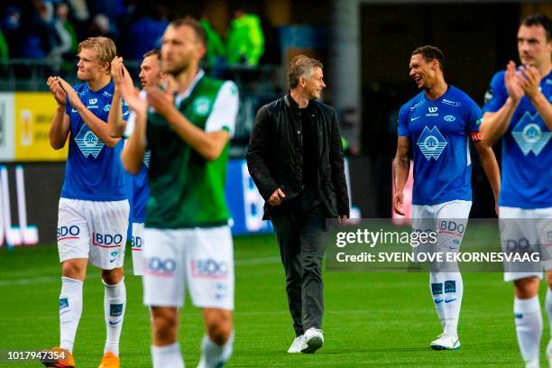 Molde FK´s headcoach Ole Gunnar Solskjaer , Nigerian defender Ruben Gabrielsen and Erling Haaland celebrate after the UEFA Champions League third...