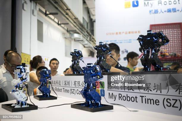 My Robot Time Co. Line Core M humanoid robots participate in a demonstration at the World Robot Conference in Beijing, Chinaon Thursday, August 16,...
