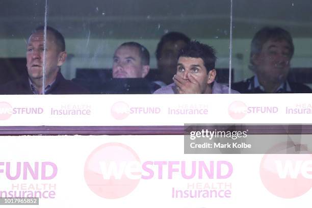 Sea Eagles coach Trent Barrett looks dejected as he watches on from the coaches box during the round 23 NRL match between the Manly Sea Eagles and...