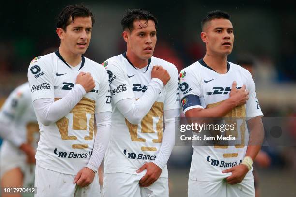 Alan Mozo, Alan Acosta and Pablo Barrera of Pumas looks on during the fourth round match between Pumas UNAM and Pachuca as part of the Torneo...