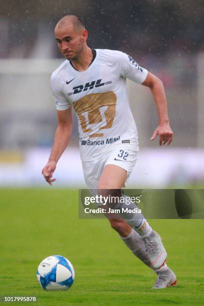 Carlos Gonzalez of Pumas drives the ball during the fourth round match between Pumas UNAM and Pachuca as part of the Torneo Apertura 2018 Liga MX at...